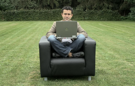 Web video man on chair.